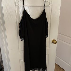 A line mini black dress with peak-a-boo shoulders